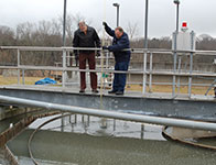 Photo of people at a water treatment facility. Link to Tangible Personal Property