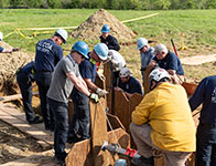 People working at a construction site. Links to Gifts of Life Insurance