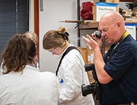 People working together on a project. Links to Closely Held Business Stock